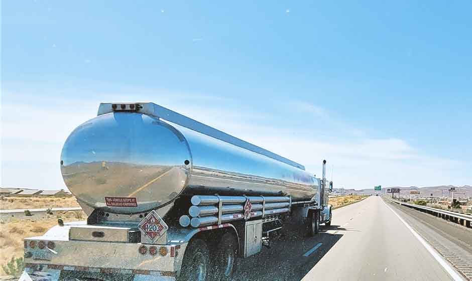 Tanker truck with hazardous placard